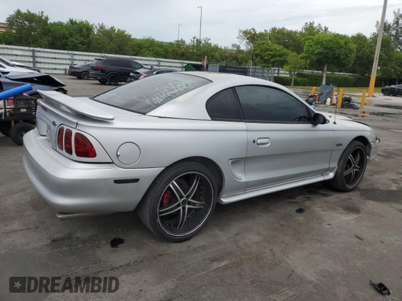 1998 Ford Mustang GT z VIN 1FAFP42XXWF229613, wystawiony jako Copart lot #63231905 z przebiegiem 65 669 mil mil oraz Szkoda całkowita • Salvage title. Historia ofert i sprzedaży dostępna na DreamBid. Obrazek 3.