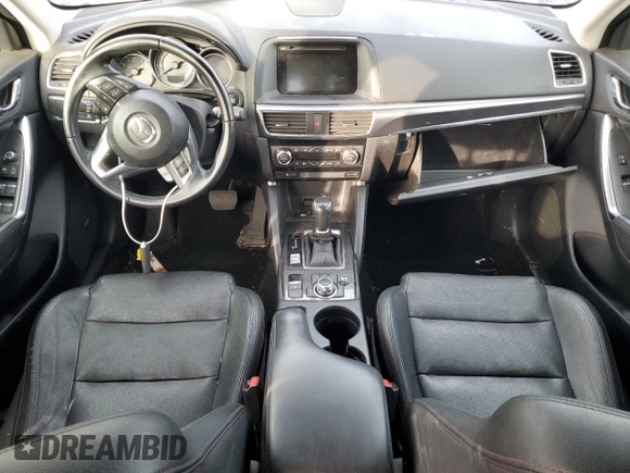 2016 Mazda CX-5 Grand Touring with VIN JM3KE4DY0G0876540, listed as a Copart auction lot 42132815 with 110,158 mi miles and Salvage Title. Bid and sale history available at DreamBid. Image 8.