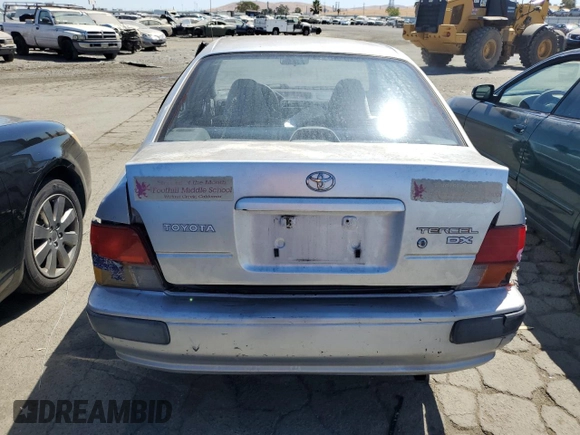 1995 Toyota Tercel DX z VIN JT2EL56E7S7011335, wystawiony jako Copart lot #67978774 z przebiegiem 182 025 mil mil oraz Szkoda całkowita • Salvage title. Historia ofert i sprzedaży dostępna na DreamBid. Obrazek 6.