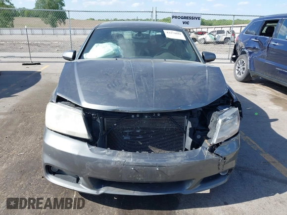 2013 Dodge Avenger SXT with VIN 1C3CDZCG5DN544909, listed as a IAAI auction lot 42274681 with 136,781 mi miles and . Bid and sale history available at DreamBid. Image 13.