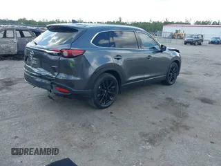 2022 Mazda CX-9 Touring Plus with VIN JM3TCBAY9N0624575, listed as a IAAI auction lot 42326284 with 16,572 mi miles and . Bid and sale history available at DreamBid. Image 4.