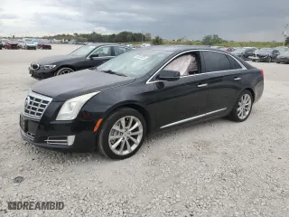2014 Cadillac XTS Luxury with VIN 2G61N5S34E9270925, listed as a Copart auction lot 46046055 with 134,649 mi miles and Salvage Title. Bid and sale history available at carsss.com. Image 1.