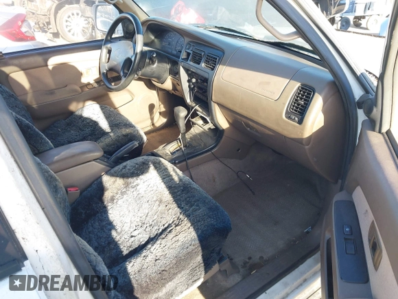 1998 Toyota 4Runner SR5 z VIN JT3GN86R9W0063096, wystawiony jako IAAI lot #41831557 z przebiegiem 168 900 mil mil oraz . Historia ofert i sprzedaży dostępna na DreamBid. Obrazek 5.