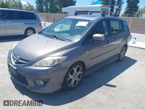 2008 Mazda 5 Grand Touring z VIN JM1CR29L680307325, wystawiony jako IAAI lot #42267347 z przebiegiem 151 415 mil mil oraz . Historia ofert i sprzedaży dostępna na DreamBid. Obrazek 2.