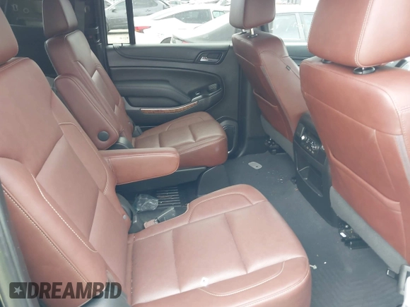 2019 Chevrolet Suburban Premier with VIN 1GNSKJKJ3KR231852, listed as a IAAI auction lot 41957728 with 136,263 mi miles and . Bid and sale history available at DreamBid. Image 8.