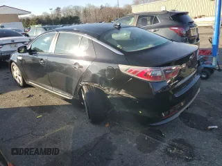 2015 Kia Optima Hybrid EX with VIN KNAGN4AD4F5091212, listed as a Copart auction lot 79506883 with 96,620 mi miles and Salvage Title. Bid and sale history available at carsss.com. Image 2.