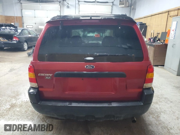 2003 Ford Escape XLT Popular 2 with VIN 1FMYU93103KB33975, listed as a Copart auction lot 70219724 with 182,037 mi miles and Clean Title. Bid and sale history available at carsss.com. Image 6.