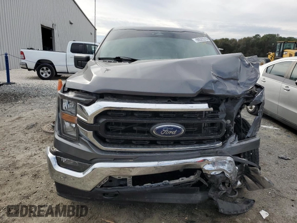 2023 Ford F-150 XL with VIN 1FTEW1EB0PKE65574, listed as a Copart auction lot 88522215 with 80,828 mi miles and Salvage Title. Bid and sale history available at carsss.com. Image 5.