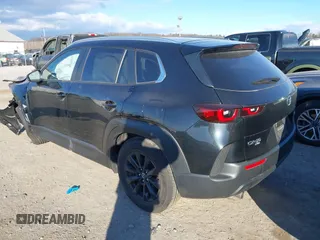 2023 Mazda CX-50 2.5 S Preferred Plus Package with VIN 7MMVABCM0PN138180, listed as a IAAI auction lot 41875179 with 33,652 mi miles. Bid and sale history available at carsss.com. Image 3.