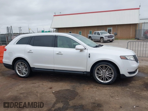 2014 Lincoln MKT EcoBoost with VIN 2LMHJ5AT0EBL50661, listed as a IAAI auction lot 41898237 with 118,770 mi miles and . Bid and sale history available at DreamBid. Image 13.