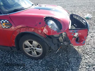 2015 MINI Hardtop 4 Door z VIN WMWXS5C59FT829635, wystawiony jako IAAI lot #42046985 z przebiegiem 171 731 mil mil oraz . Historia ofert i sprzedaży dostępna na DreamBid. Obrazek 6.