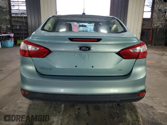 2012 Ford Focus SE with VIN 1FAHP3F27CL149328, listed as a Copart auction lot 56000325 with 147,097 mi miles and Salvage Title. Bid and sale history available at DreamBid. Image 6.