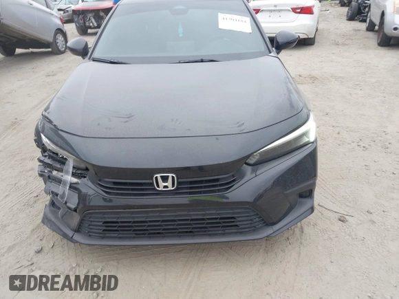 2024 Honda Civic Sport with VIN 2HGFE2F51RH594148, listed as a IAAI auction lot 41304184 with 11,307 mi miles and . Bid and sale history available at DreamBid. Image 12.