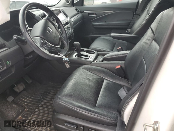 2018 Honda Pilot EX-L with VIN 5FNYF5H52JB023815, listed as a Copart auction lot 57692995 with 65,065 mi miles and Salvage title. Bid and sale history available at DreamBid. Image 7.