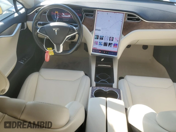 2017 Tesla Model S 100D z VIN 5YJSA1E2XHF213086, wystawiony jako Copart lot #53780875 z przebiegiem 34 205 mil mil oraz Szkoda całkowita • Salvage title. Historia ofert i sprzedaży dostępna na DreamBid. Obrazek 8.