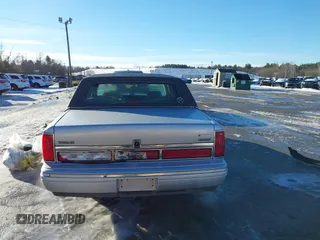 1997 Lincoln Town Car Cartier with VIN 1LNLM83W9VY661126, listed as a IAAI auction lot 41456847 with 160,710 mi miles and . Bid and sale history available at DreamBid. Image 16.