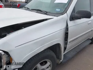 2003 GMC Envoy SLE with VIN 1GKDS13S532253648, listed as a IAAI auction lot 41850094 with 147,254 mi miles. Bid and sale history available at carsss.com. Image 12.