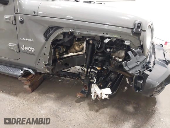 2019 Jeep Wrangler Unlimited Sahara with VIN 1C4HJXEG9KW656454, listed as a IAAI auction lot 41648236 with 75,403 mi miles and . Bid and sale history available at DreamBid. Image 6.