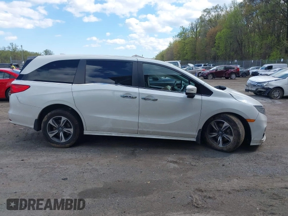 2018 Honda Odyssey Touring with VIN 5FNRL6H81JB023530, listed as a IAAI auction lot 42040124 with 109,128 mi miles and . Bid and sale history available at DreamBid. Image 13.