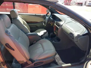 1999 Chrysler Sebring JXi with VIN 3C3EL55H6XT603058, listed as a IAAI auction lot 41998553 with 157,872 mi miles and . Bid and sale history available at DreamBid. Image 5.