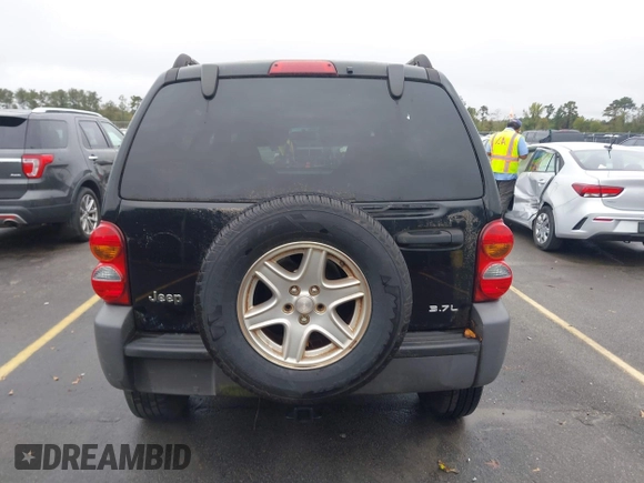 2003 Jeep Liberty Sport with VIN 1J4GK48KX3W656837, listed as a IAAI auction lot 40785615 with 164,450 mi miles and . Bid and sale history available at DreamBid. Image 16.