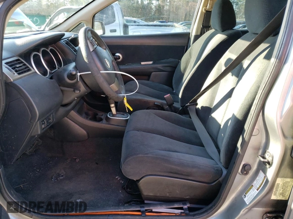 2010 Nissan Versa 1.8 SL with VIN 3N1BC1CPXAL452642, listed as a Copart auction lot 48293175 with 139,716 mi miles and Salvage Title. Bid and sale history available at carsss.com. Image 7.