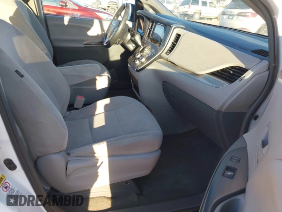 2017 Toyota Sienna L with VIN 5TDZZ3DC3HS828040, listed as a IAAI auction lot 41824384 with 76,159 mi miles. Bid and sale history available at carsss.com. Image 5.