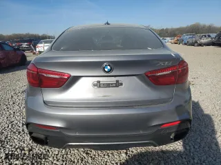 2016 BMW X6 xDrive50i with VIN 5UXKU6C57G0R33958, listed as a Copart auction lot 49774065 with 124,226 mi miles and Salvage Title. Bid and sale history available at carsss.com. Image 6.