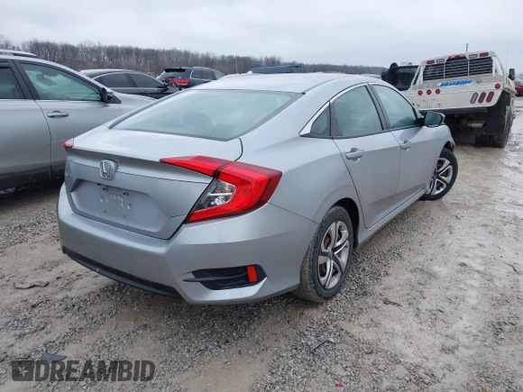 2017 Honda Civic LX z VIN 2HGFC2F51HH562496, wystawiony jako IAAI lot #41524243 z przebiegiem Nie podano mil oraz . Historia ofert i sprzedaży dostępna na DreamBid. Obrazek 4.