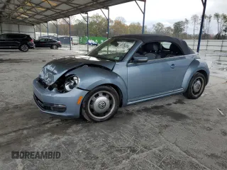 2016 Volkswagen Beetle S with VIN 3VW517ATXGM821244, listed as a Copart auction lot 83764204 with 70,567 mi miles and Salvage Title. Bid and sale history available at DreamBid. Image 1.