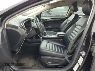 2019 Ford Fusion Hybrid SEL with VIN 3FA6P0MU5KR235893, listed as a Copart auction lot 49295113 with 129,936 mi miles. Bid and sale history available at carsss.com. Image 7.