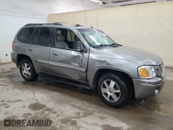 2005 GMC Envoy SLE with VIN 1GKDS13S952383743, listed as a Copart auction lot 43797315 with 185,833 mi miles and Salvage title. Bid and sale history available at DreamBid. Image 4.