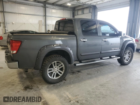 2012 Nissan Titan SL with VIN 1N6BA0ECXCN300562, listed as a Copart auction lot 58244125 with 131,595 mi miles and Salvage title. Bid and sale history available at DreamBid. Image 3.