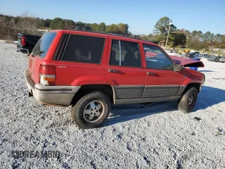 1995 Jeep Grand Cherokee Laredo with VIN 1J4GZ58S7SC747906, listed as a Copart auction lot 82529374 with 73,932 mi miles and Salvage Title. Bid and sale history available at carsss.com. Image 3.