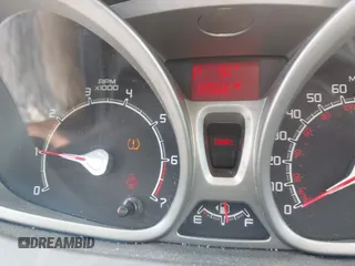 2012 Ford Fiesta SE с VIN 3FADP4BJ4CM155538, выставлен на аукционе IAAI как лот 42352703 с пробегом 100 666 миль миль и . История ставок и продаж доступна на DreamBid. Изображение 7.
