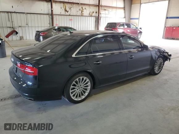 2016 Audi A8 Sport z VIN WAU43AFD1GN011589, wystawiony jako Copart lot #86614934 z przebiegiem 96 137 mil mil oraz Szkoda całkowita • Salvage title. Historia ofert i sprzedaży dostępna na DreamBid. Obrazek 3.