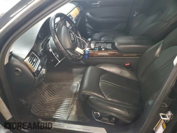 2011 Audi A8 z VIN WAURVAFD7BN006275, wystawiony jako Copart lot #58306205 z przebiegiem 190 383 mil mil oraz Szkody całkowita. Historia ofert i sprzedaży dostępna na DreamBid. Obrazek 7.