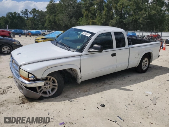 2003 Dodge Dakota SLT with VIN 1D7HL42XX3S333865, listed as a Copart auction lot 73509404 with 123,515 mi miles and Salvage Title. Bid and sale history available at carsss.com. Image 1.