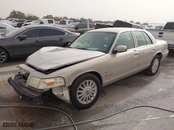 2010 Mercury Grand Marquis LS with VIN 2MEBM7FV5AX633703, listed as a IAAI auction lot 41728720 with 1 mi miles. Bid and sale history available at carsss.com. Image 2.