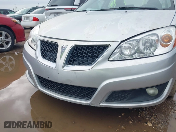2009 Pontiac G6 1SB with VIN 1G2ZJ57K094243360, listed as a IAAI auction lot 41904278 with 144,346 mi miles and . Bid and sale history available at DreamBid. Image 6.