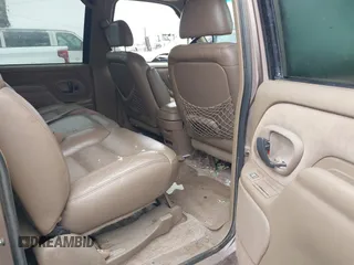 1995 GMC Suburban z VIN 1GKFK16K5SJ723038, wystawiony jako IAAI lot #41904397 z przebiegiem 142 082 mil mil oraz . Historia ofert i sprzedaży dostępna na DreamBid. Obrazek 8.