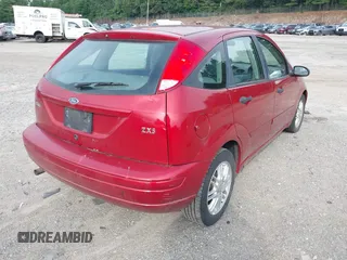 2003 Ford Focus with VIN 3FAFP37Z03R176259, listed as a IAAI auction lot 42720167 with 121,959 mi miles and . Bid and sale history available at DreamBid. Image 4.