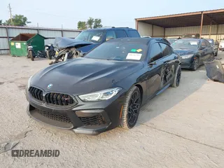 2020 BMW M8 with VIN WBSGV0C06LCD99264, listed as a IAAI auction lot 40276722 with 38,039 mi miles. Bid and sale history available at carsss.com. Image 2.