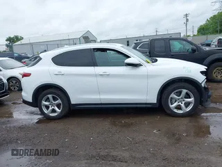 2019 Alfa Romeo Stelvio z VIN ZASPAKAN6K7C73740, wystawiony jako IAAI lot #42296395 z przebiegiem 49 646 mil mil oraz . Historia ofert i sprzedaży dostępna na DreamBid. Obrazek 14.