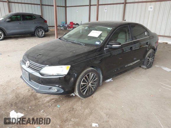 2012 Volkswagen Jetta Sedan SEL w/Sunroof with VIN 3VWLX7AJ5CM379634, listed as a IAAI auction lot 41634048 with 209,586 mi miles. Bid and sale history available at carsss.com. Image 18.