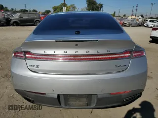 2015 Lincoln MKZ z VIN 3LN6L2G9XFR610736, wystawiony jako Copart lot #80662274 z przebiegiem 101 441 mil mil oraz Szkoda całkowita • Salvage title. Historia ofert i sprzedaży dostępna na DreamBid. Obrazek 6.