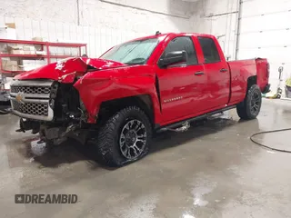 2014 Chevrolet Silverado 1500 LT with VIN 1GCVKREC2EZ407599, listed as a IAAI auction lot 41513210 with 168,352 mi miles and . Bid and sale history available at DreamBid. Image 2.