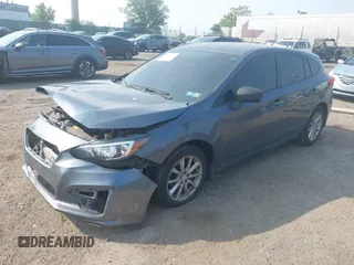 2018 Subaru Impreza with VIN 4S3GTAA63J3748319, listed as a IAAI auction lot 42441310 with 71,616 mi miles and . Bid and sale history available at DreamBid. Image 2.
