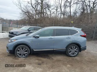 2020 Honda CR-V Touring with VIN 2HKRW2H92LH657975, listed as a IAAI auction lot 41627776 with 46,590 mi miles and . Bid and sale history available at DreamBid. Image 14.