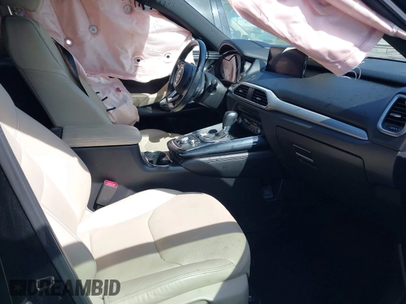 2021 Mazda CX-9 Carbon Edition with VIN JM3TCBDY3M0524241, listed as a IAAI auction lot 42538127 with 50,533 mi miles and . Bid and sale history available at DreamBid. Image 5.